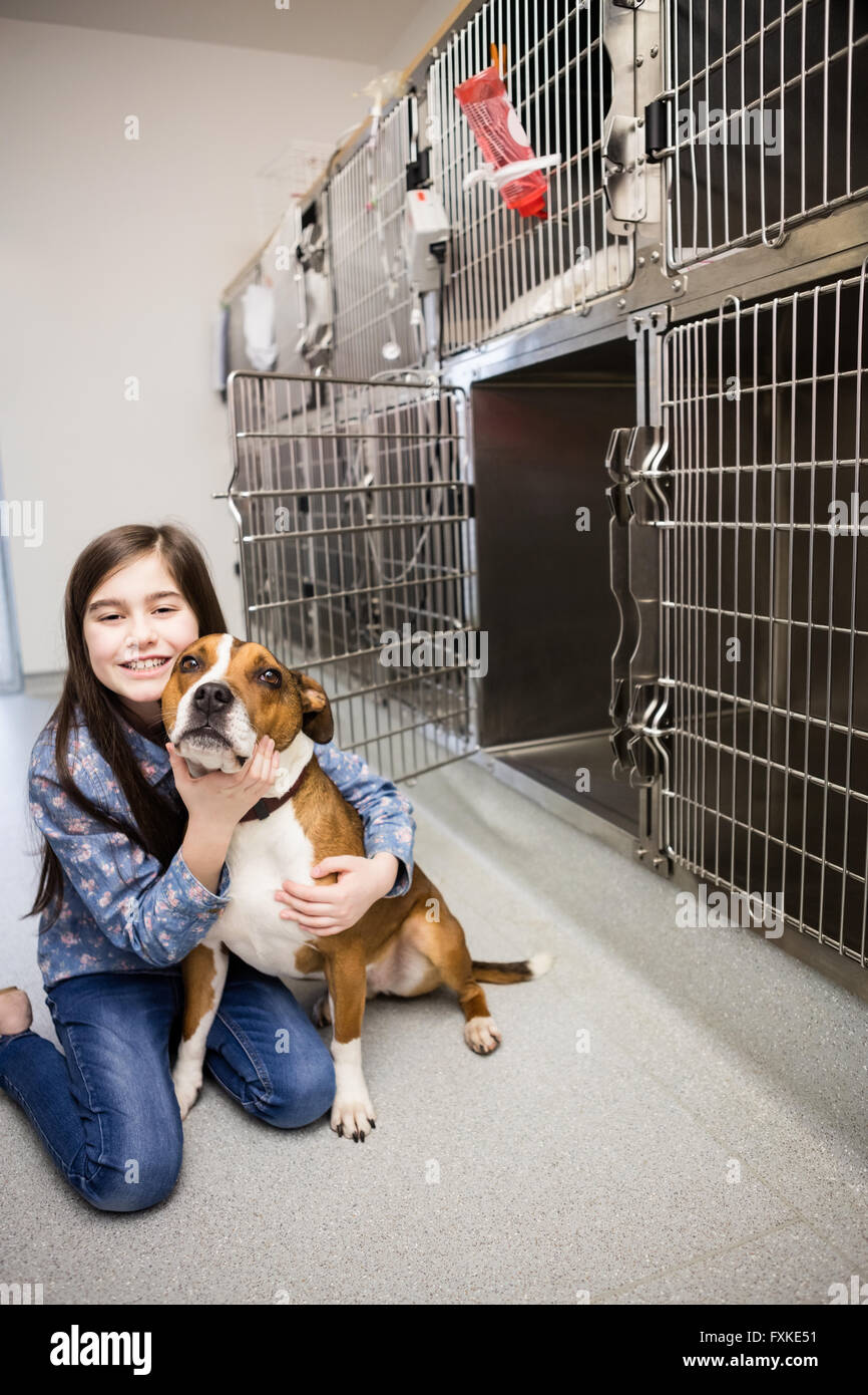 Girl playing with her pet dog Stock Photo - Alamy