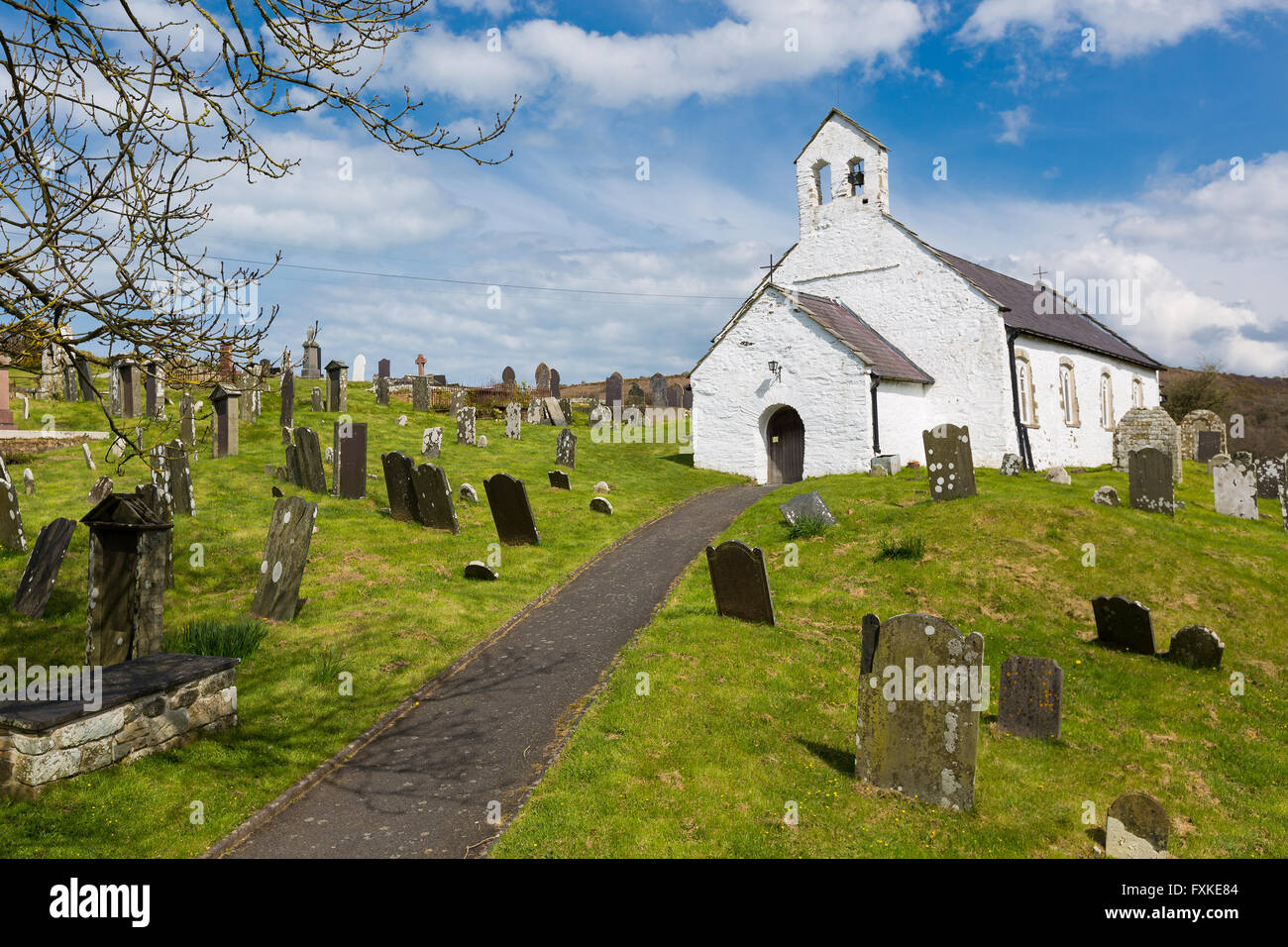 Exterior of St Michael's Church, Penbryn, Wales on a bright sunny day. Stock Photo