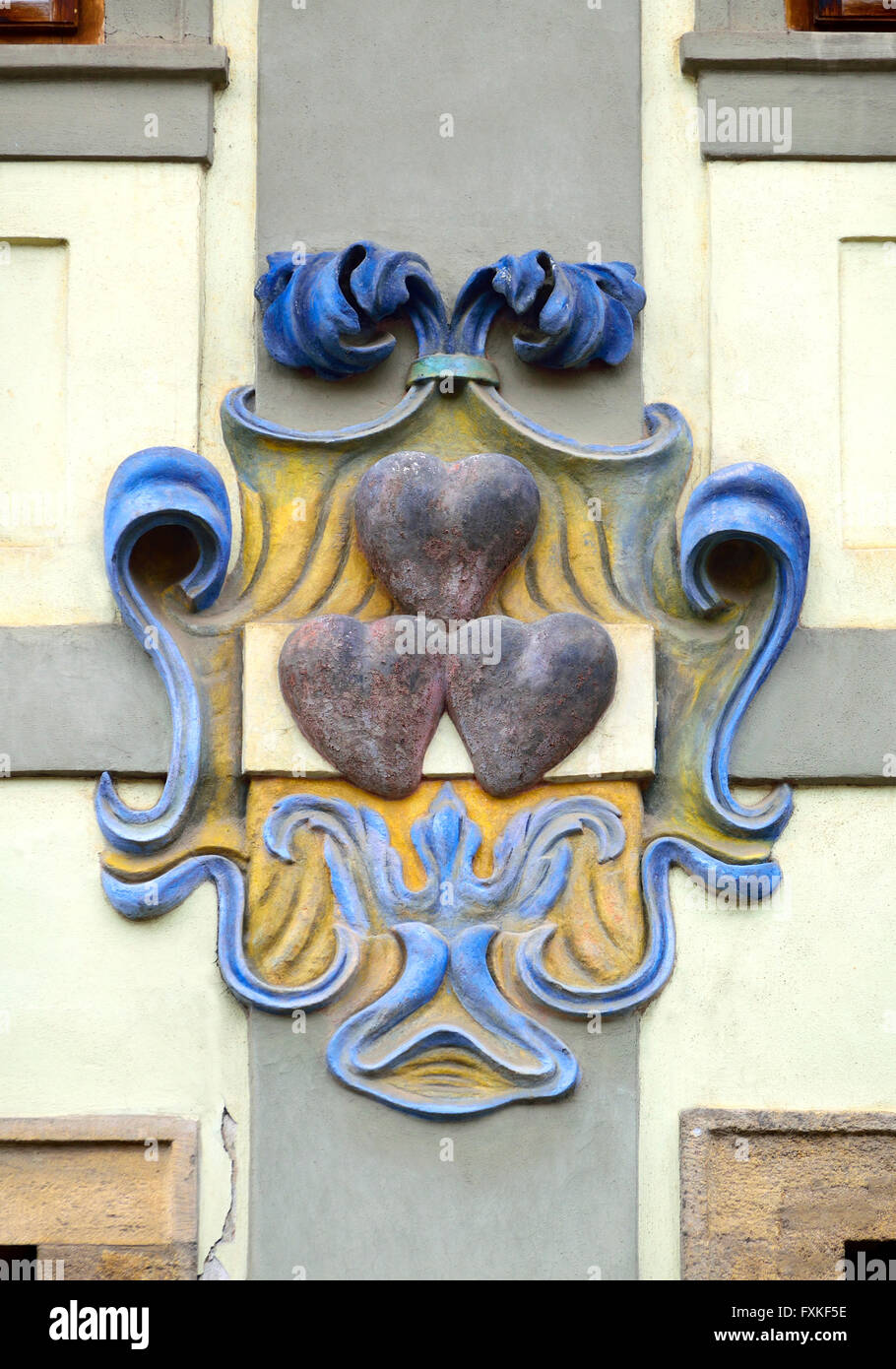 Prague, Czech Republic. Traditional House Sign: At The Three Red Hearts (U tri cervenych srdci) at Uvoz 14/165 Stock Photo