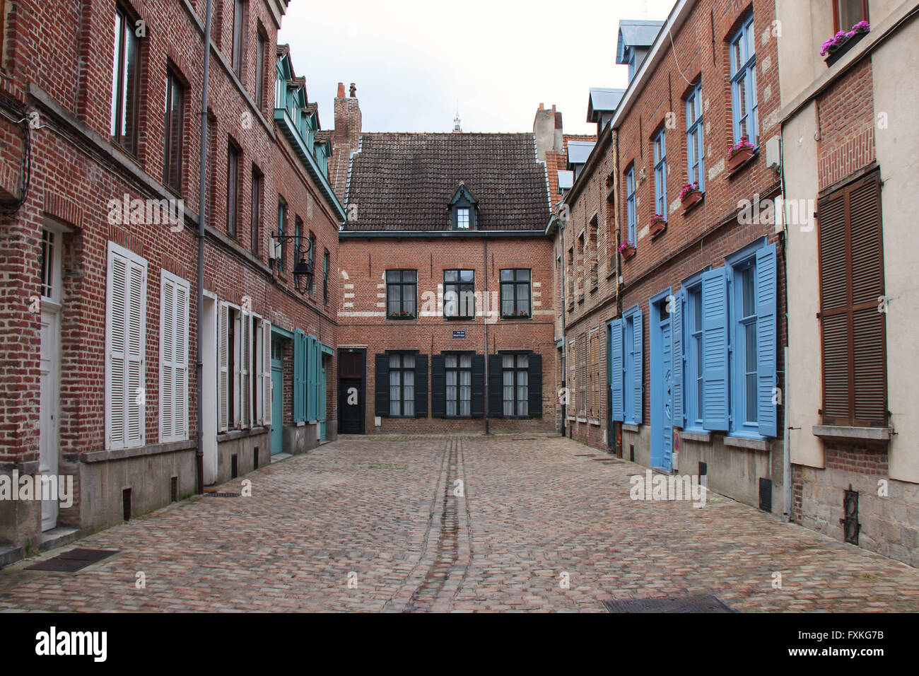 A cul-de-sac and private terraced houses in Lille (France). Stock Photo