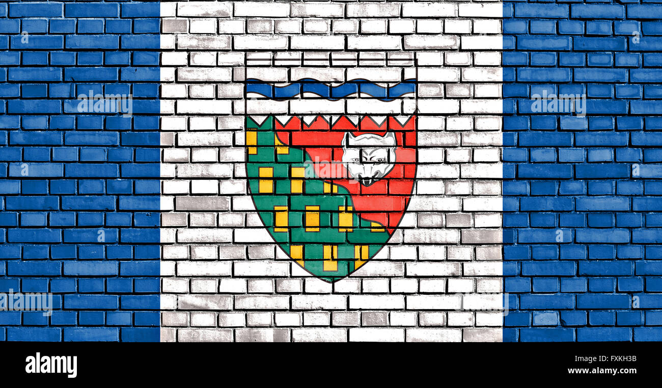 flag of Northwest Territories painted on brick wall Stock Photo