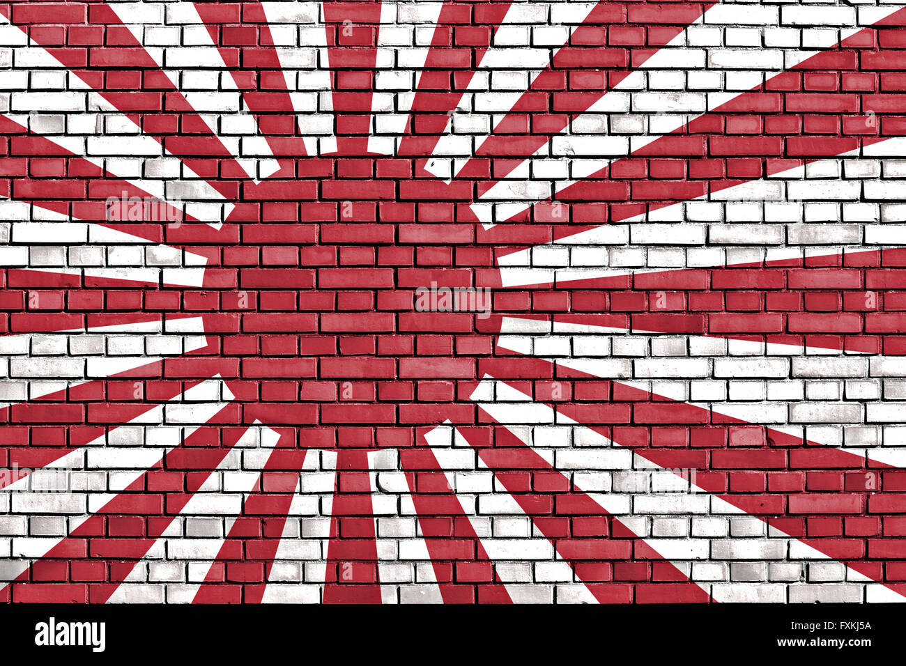 Naval flag of the Empire of Japan painted on brick wall Stock Photo