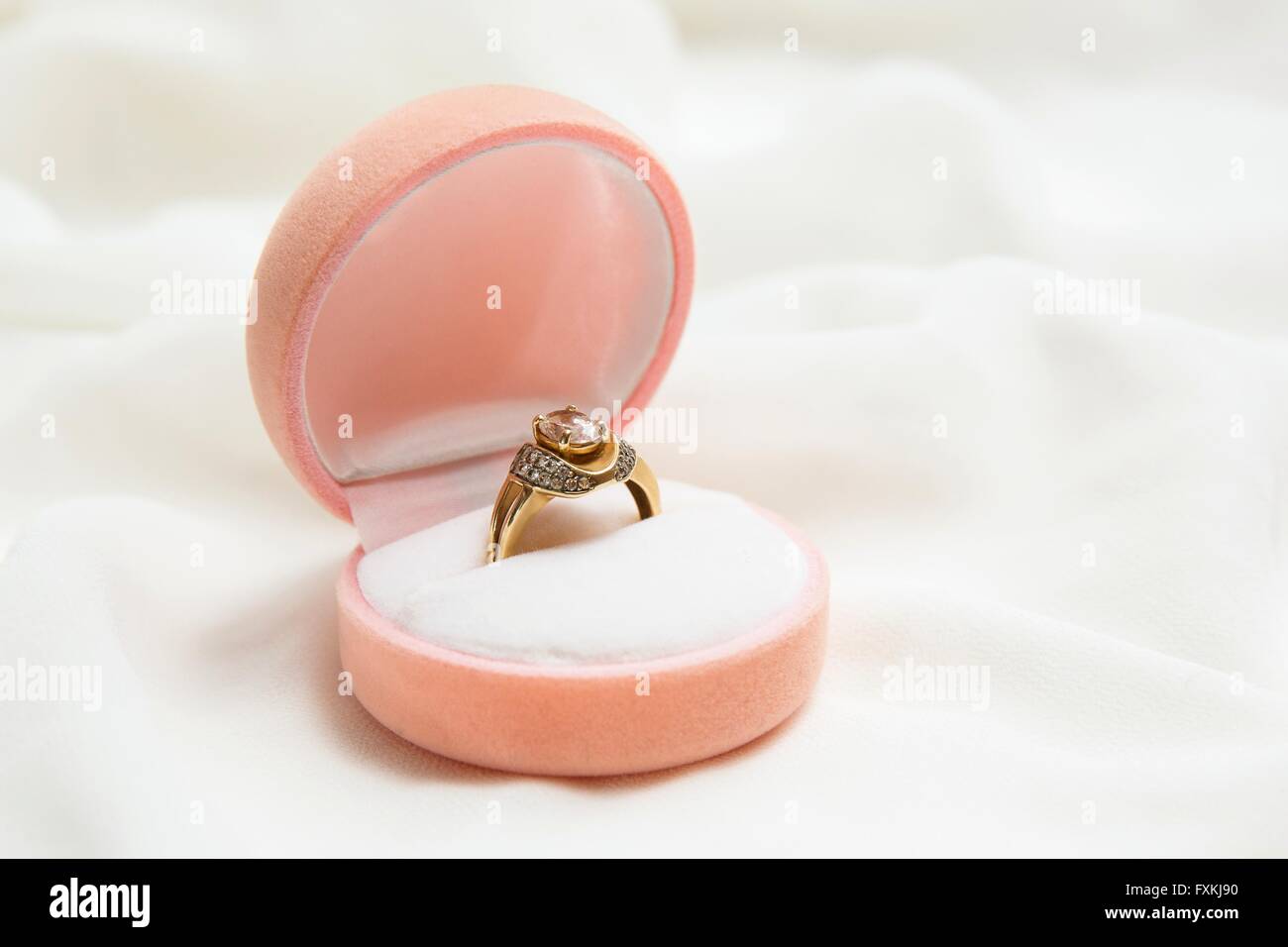 Engagement gold ring in box Stock Photo - Alamy