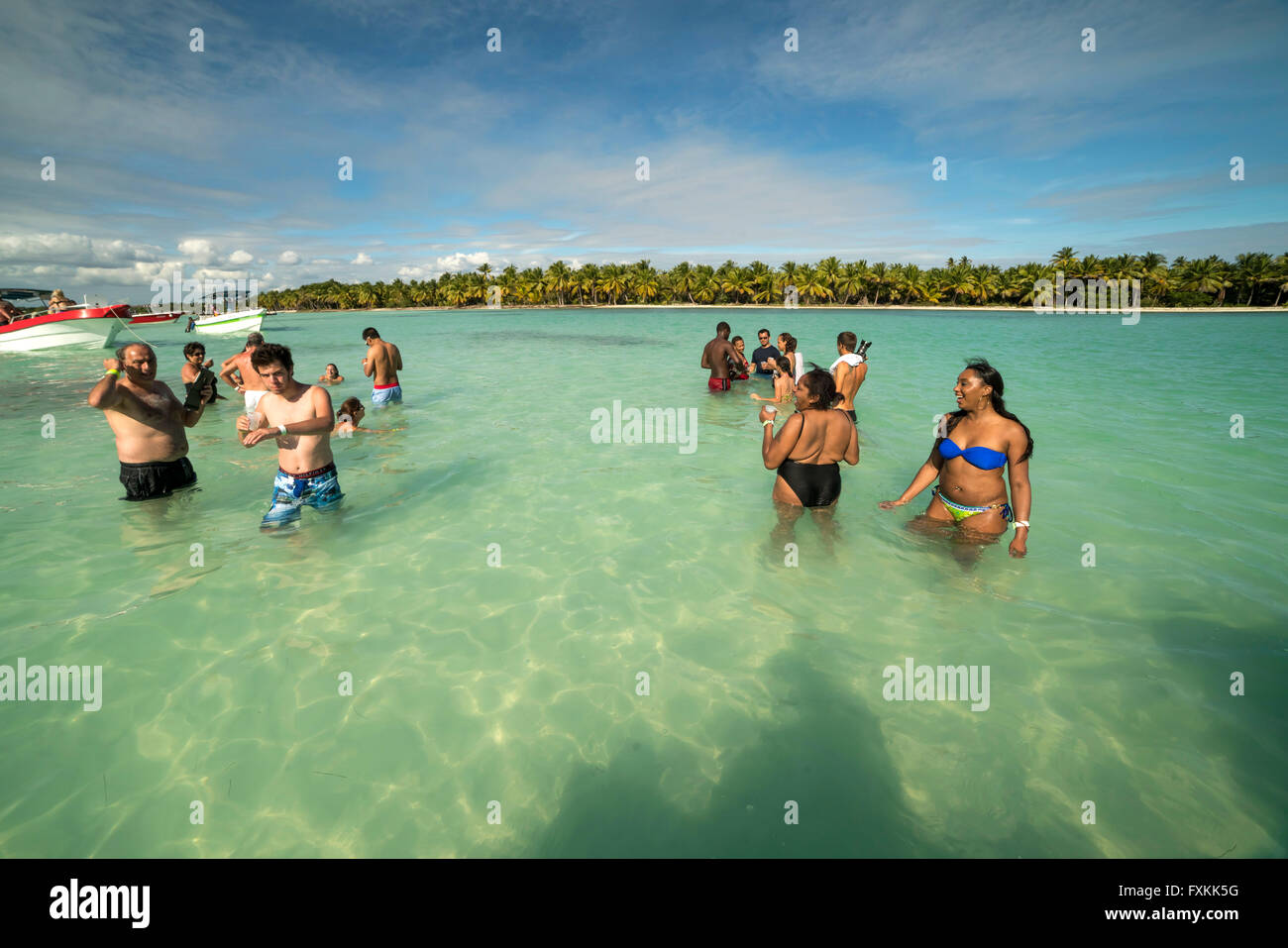 tourists enjoying the blue lagoon, Parque Nacional del Este, Dominican