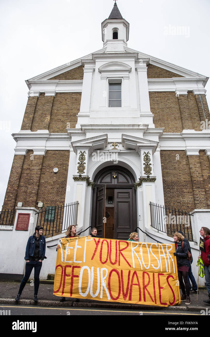 London, UK. 16th April, 2016. Campaigners from feminist, anti-capitalist and LGBT groups hold a ‘reproductive rights’ protest outside St Francis of Assisi church in Stratford. They were protesting against recent intimidation of women outside an abortion clinic by faith-based anti-abortionists and a proposed march by them from the church to the abortion clinic. Credit:  Mark Kerrison/Alamy Live News Stock Photo