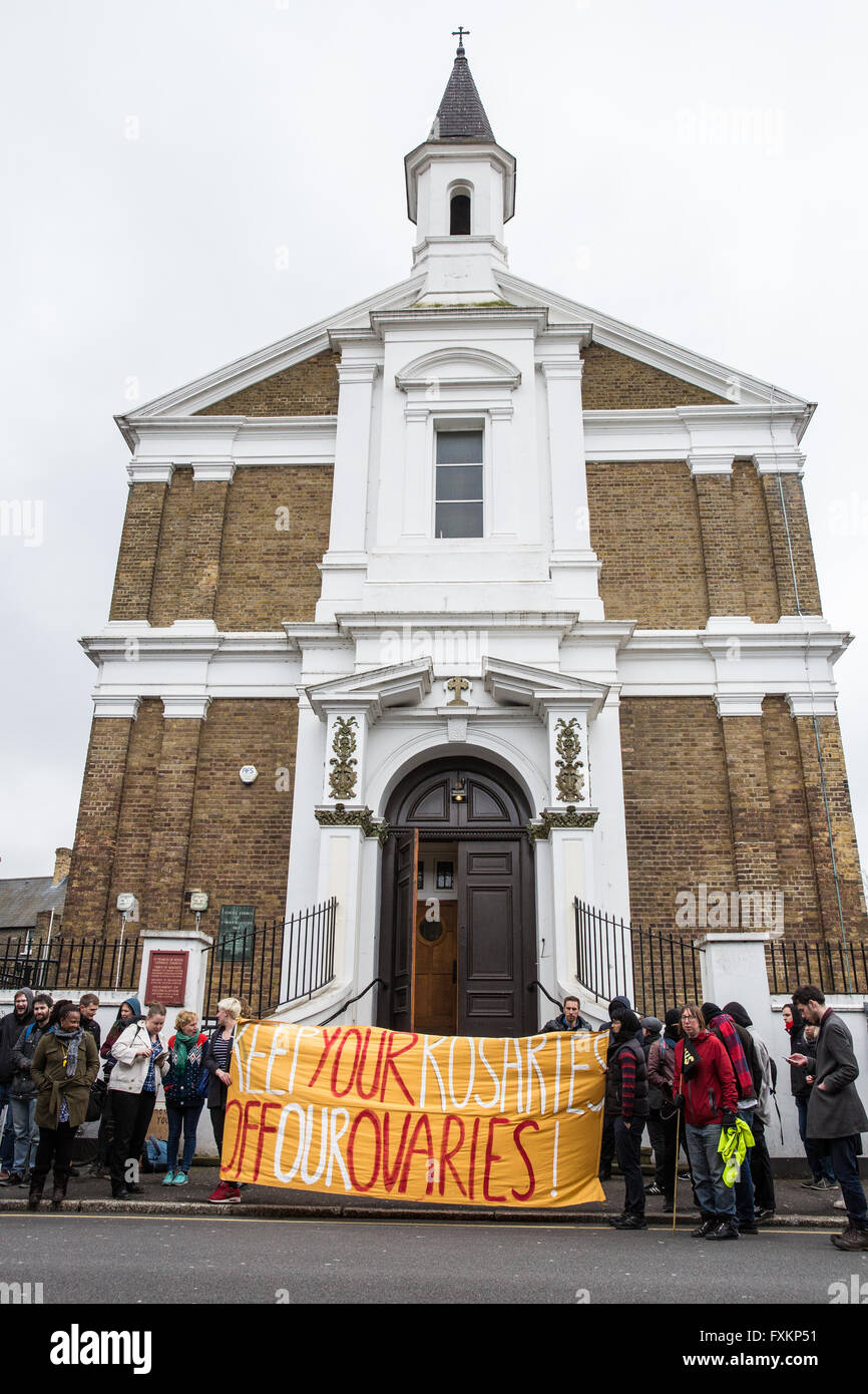 London, UK. 16th April, 2016. Campaigners from feminist, anti-capitalist and LGBT groups hold a ‘reproductive rights’ protest outside St Francis of Assisi church in Stratford. They were protesting against recent intimidation of women outside an abortion clinic by faith-based anti-abortionists and a proposed march by them from the church to the abortion clinic. Credit:  Mark Kerrison/Alamy Live News Stock Photo