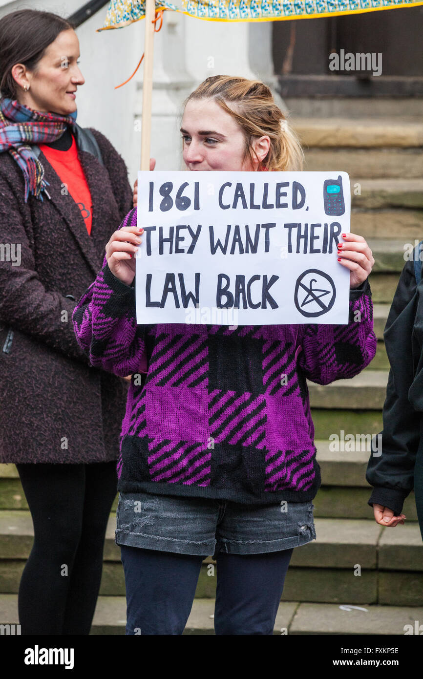 London, UK. 16th April, 2016. A pro-choice campaigner holds a sign during a ‘reproductive rights’ protest outside St Francis of Assisi church in Stratford. They were protesting against recent intimidation of women outside an abortion clinic by faith-based anti-abortionists and a proposed march by them from the church to the abortion clinic. Credit:  Mark Kerrison/Alamy Live News Stock Photo