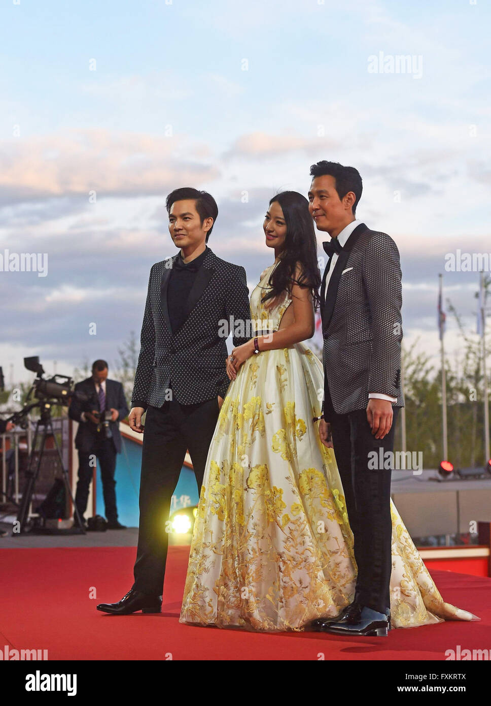 Beijing, China. 16th Apr, 2016. Actor Wallace Chung, actress Lang Yueting and actor Lee Jung Jae (from L to R) attend a red carpet event during the opening ceremony of the 6th Beijing International Film Festival (BJIFF) in Beijing, capital of China, April 16, 2016. The BJIFF kicked off Saturday and will last until April 23. Credit:  Jin Liangkuai/Xinhua/Alamy Live News Stock Photo