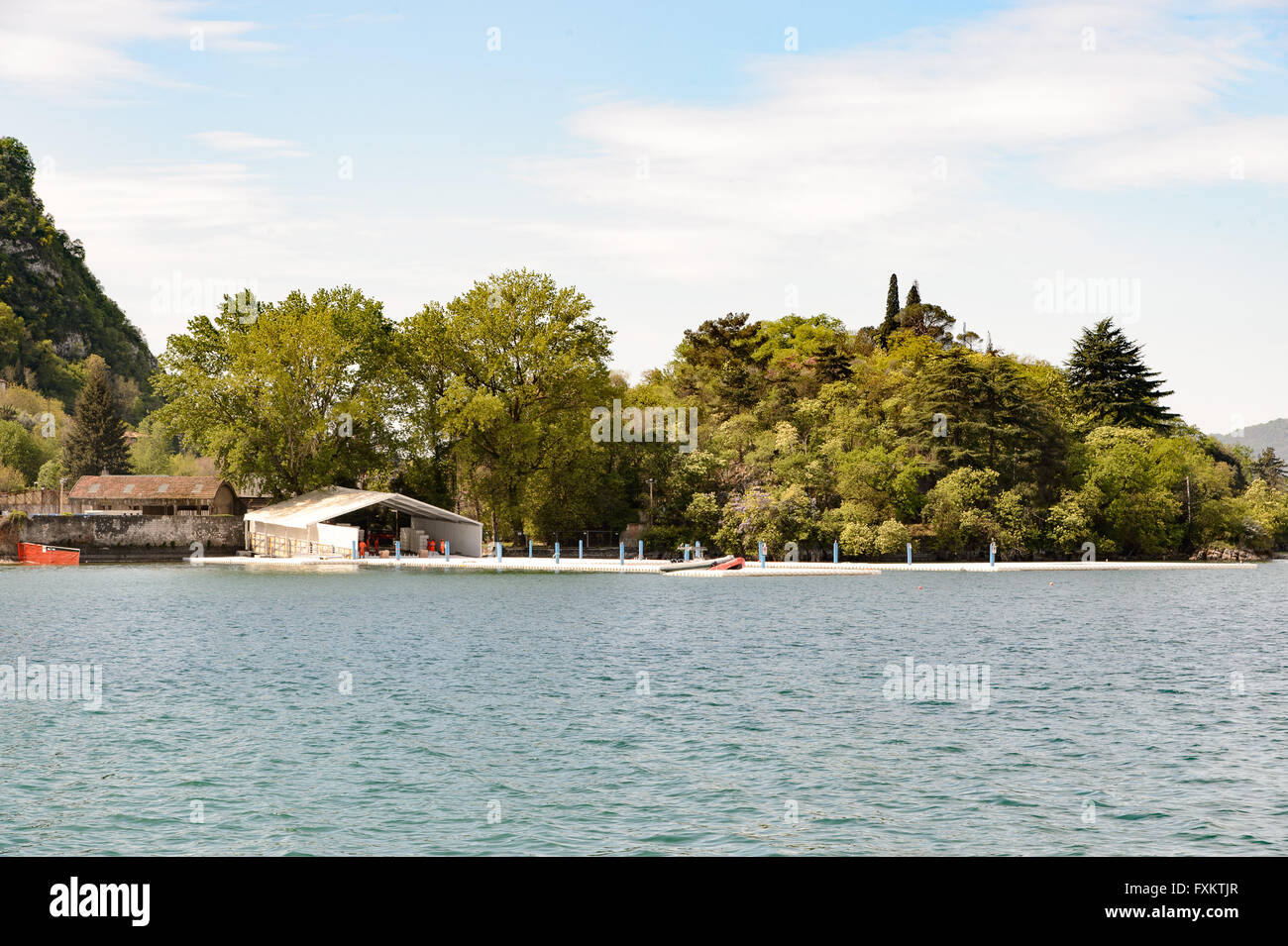 Lake Iseo, Italy. 16th April, 2016. Workers build Christo and Jeanne-Claude's artwork 'The Floating Pier'. Roberto Cerruti/Alamy Live News Stock Photo