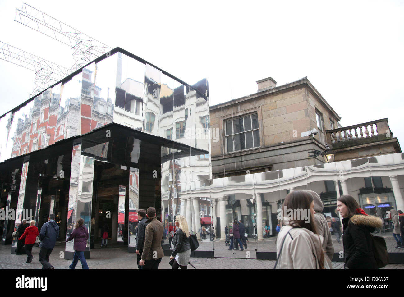 London 16 April 2016 - Covent Garden is wrapped with 32,000 sq ft of mirrors. Reflect London is a new project, created by design agency Sculptivate, which uses 67 reflective surfaces on the eastern faade of  Covent Garden's Market Building. Credit:  Dinendra Haria/Alamy Live News Stock Photo