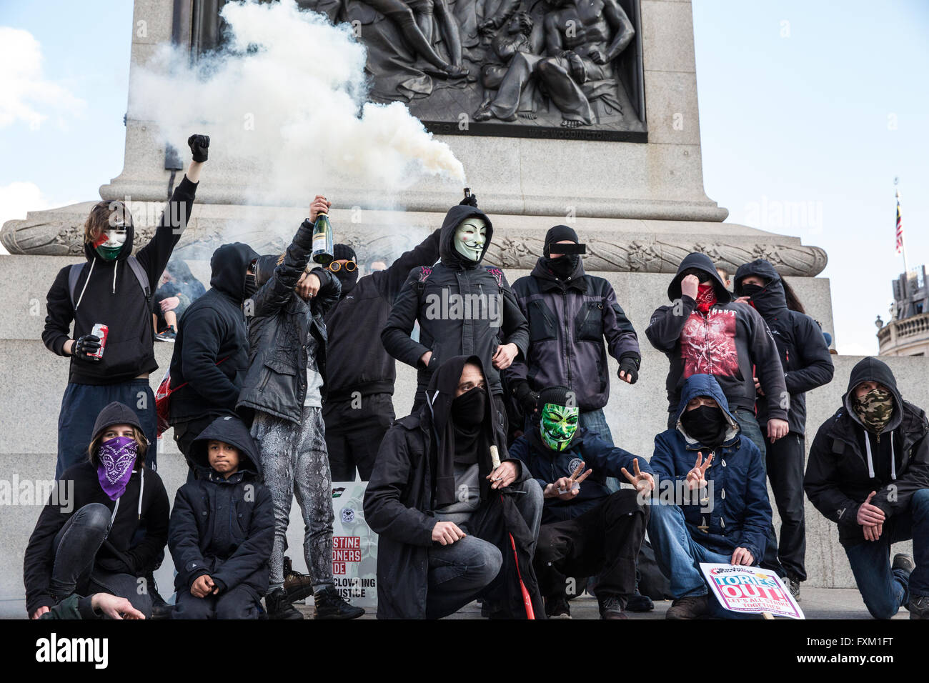 London, UK. 16th April, 2016. Black bloc protesters in Trafalgar Square following the March for Health, Homes, Jobs and Education organised by the People’s Assembly. Credit:  Mark Kerrison/Alamy Live News Stock Photo