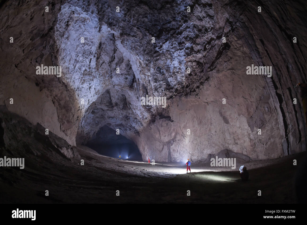 Beijing, Ziyun County of southwest China's Guizhou Province. 14th Apr, 2016. Expedition members work within the Miao Room Chamber, China's largest cave chamber by volume, in Ziyun County of southwest China's Guizhou Province, April 14, 2016. In 2014, National Geographic announced Miao Room Chamber, with a volume of some 19.78 million cubic meters, as the world's largest cave chamber. © Ou Dongqu/Xinhua/Alamy Live News Stock Photo