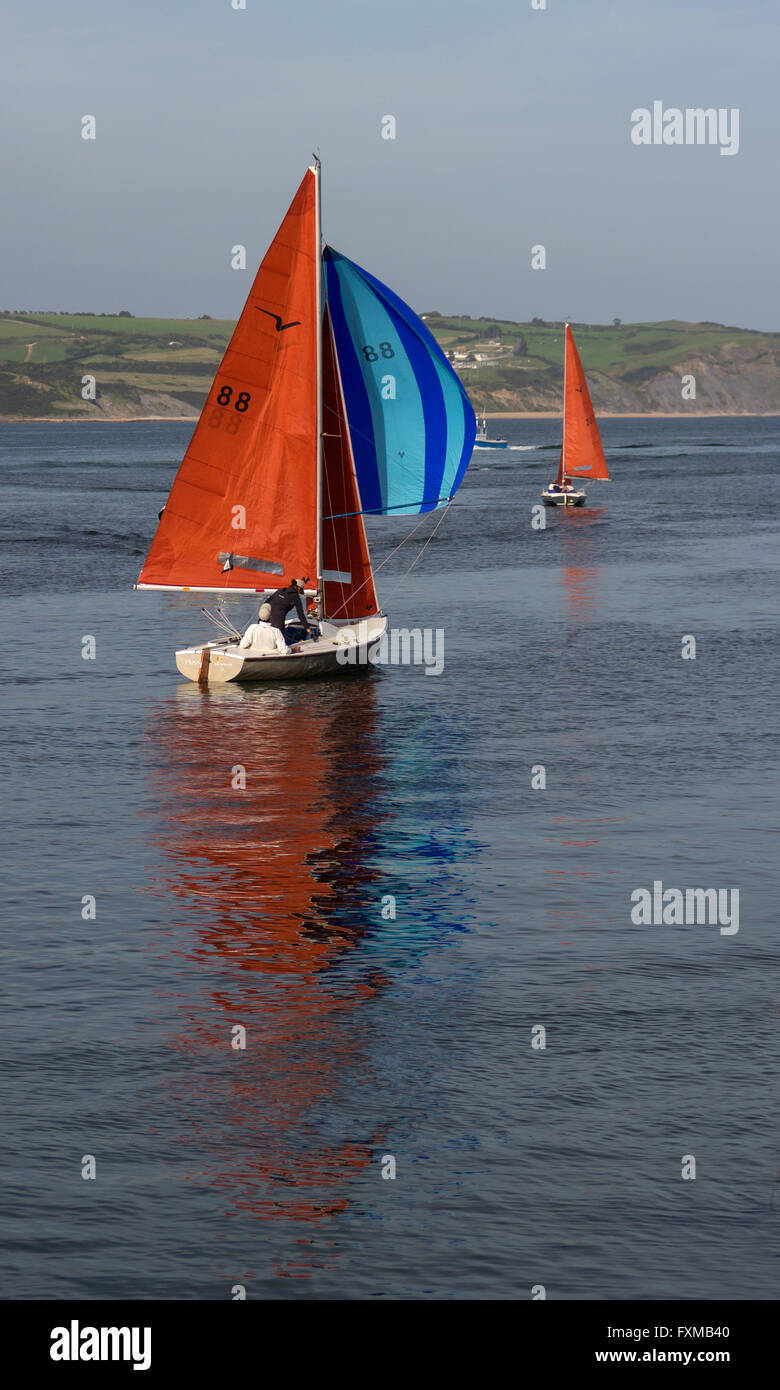 Red Sails on Water Stock Photo