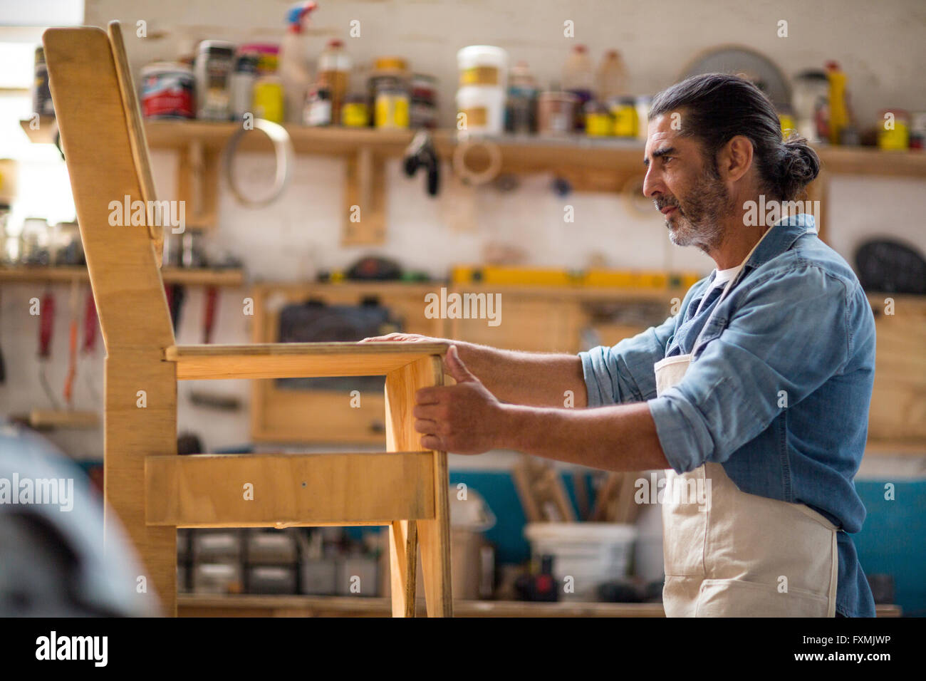 Wooden chair carpenter hires stock photography and images Alamy