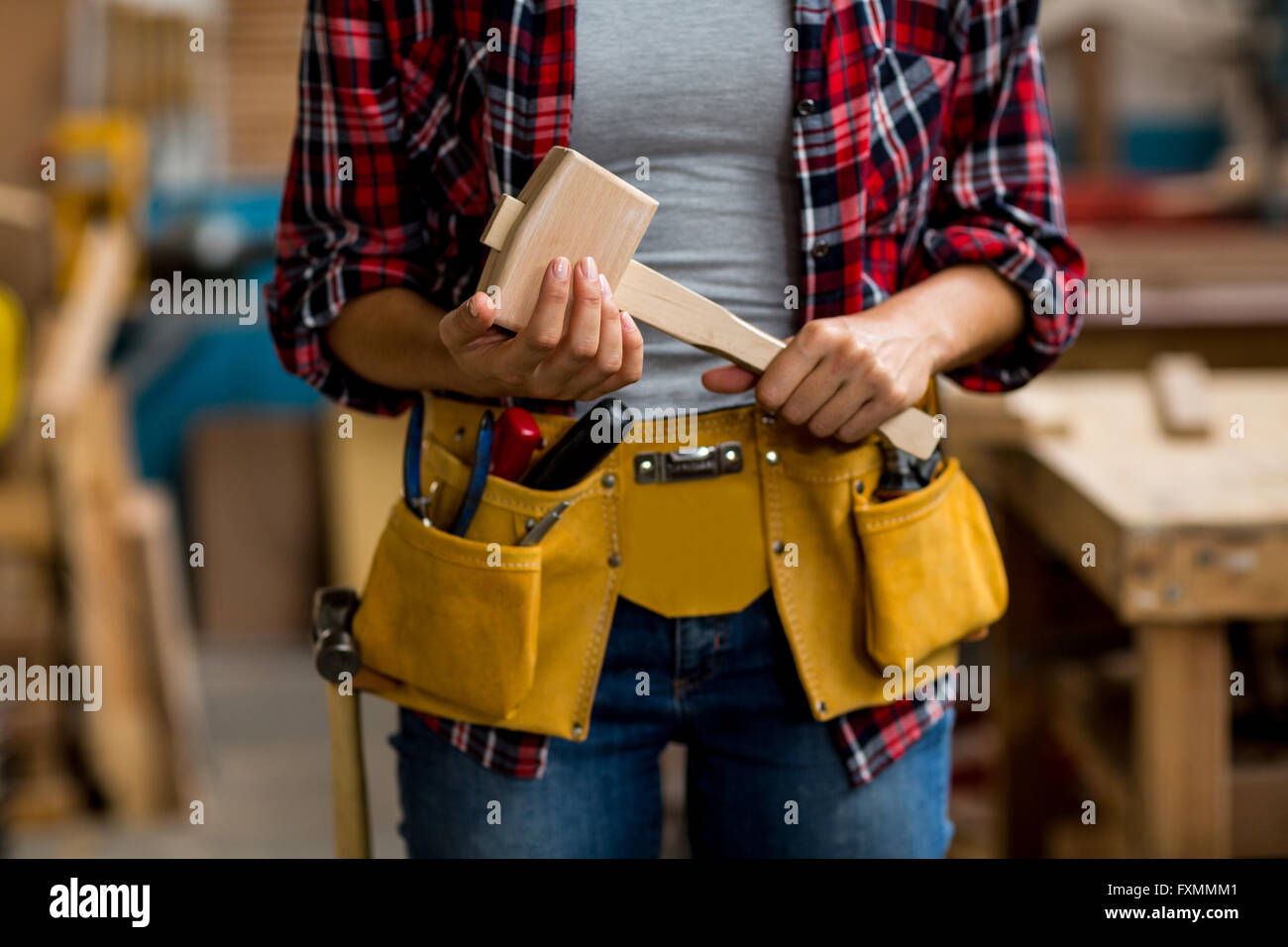 Holding belt hires stock photography and images Alamy