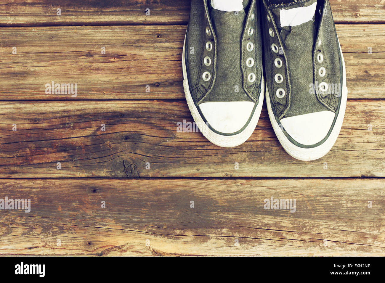 sneakers on wooden deck Stock Photo - Alamy