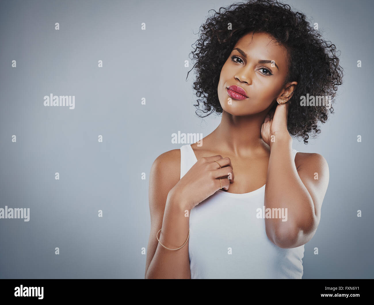 Curly black woman in white hi-res stock photography and images - Alamy