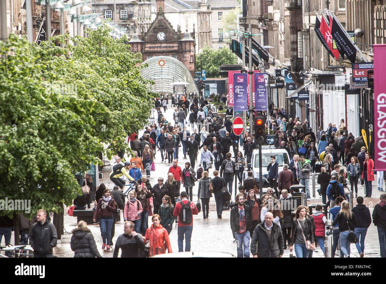 Pedestrians shopping on busy Buchanan Street Glasgow Stock Photo