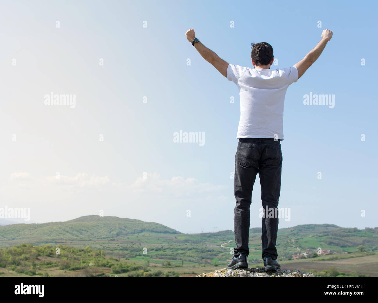 Male hiker standing top rocky hi-res stock photography and images - Alamy