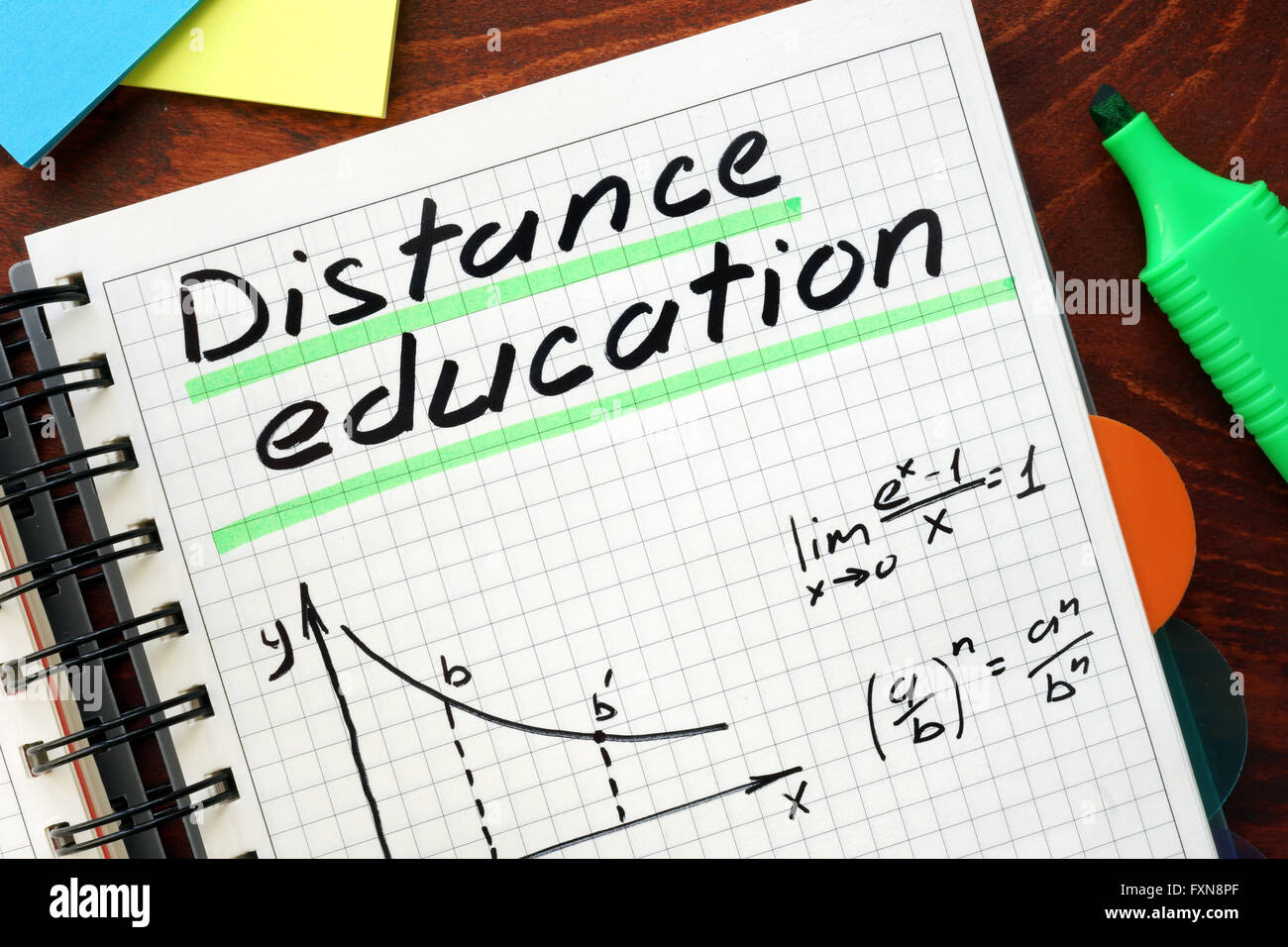 Distance education written in a notebook. Education concept. Stock Photo