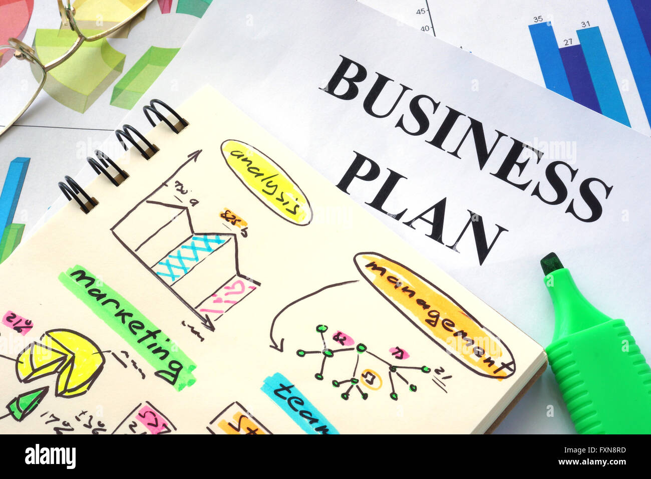 Business plan written in a notebook. Business concept. Stock Photo
