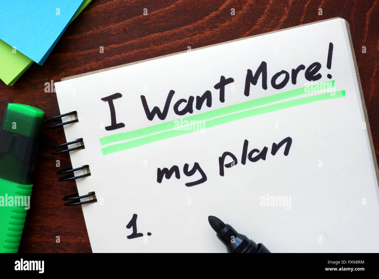 I Want More My plan written in a notebook. Motivation concept. Stock Photo