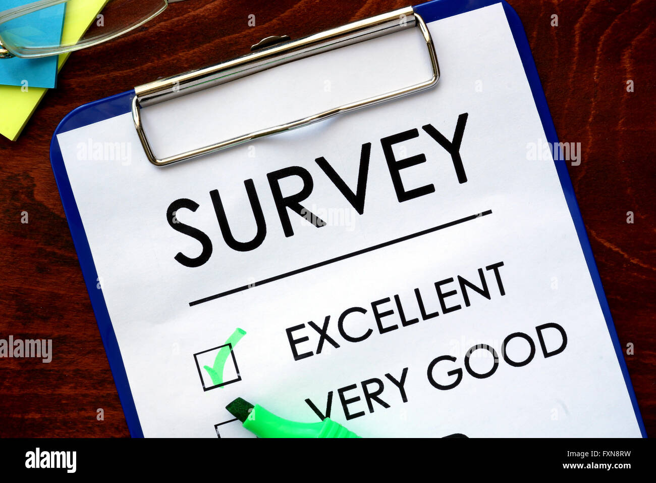 Survey written in a notebook. Marketing concept. Excellent. Stock Photo