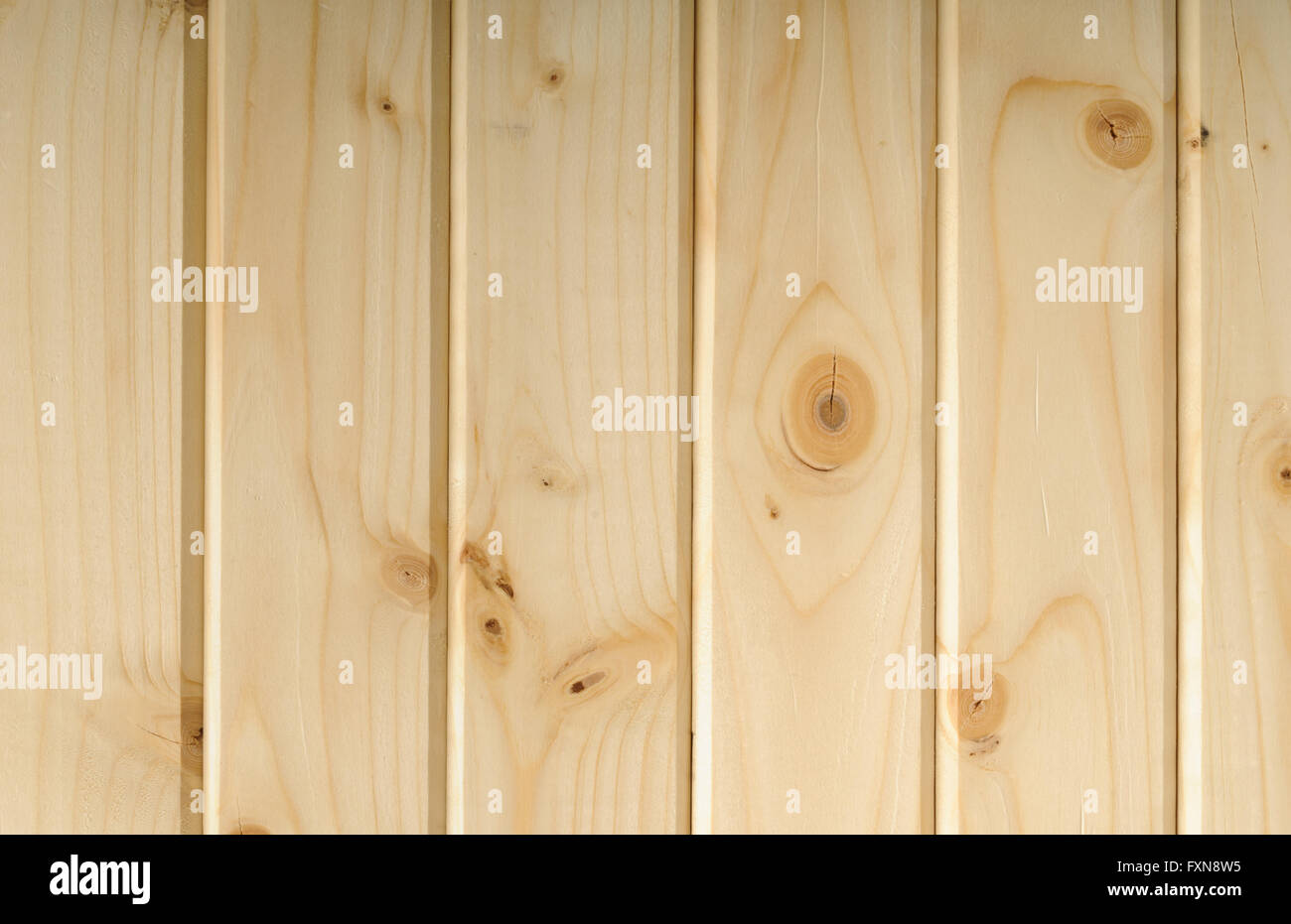 Planed and chamfered lumber from pine Stock Photo