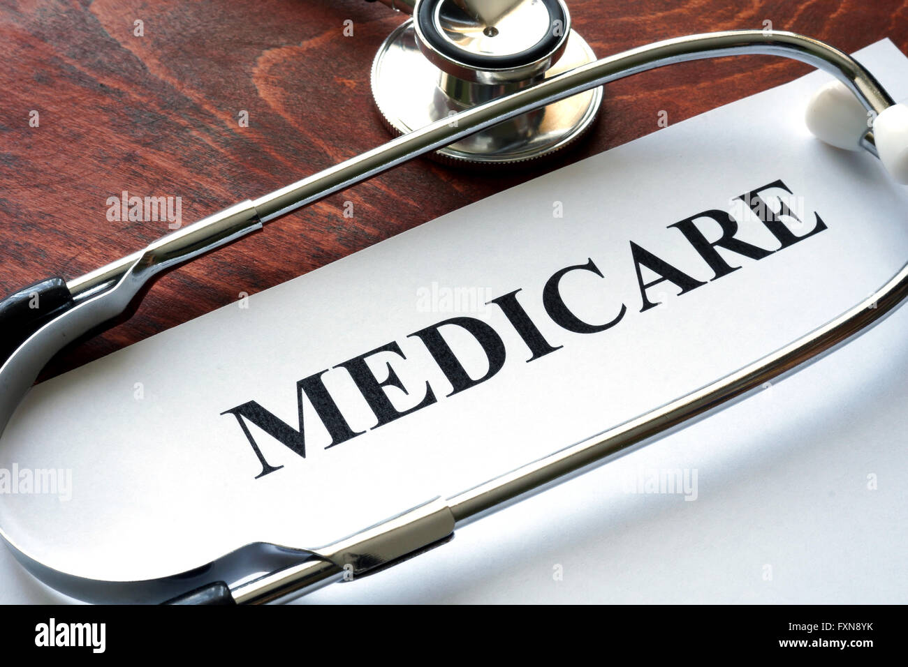 Word medicare written on a paper and stethoscope. Stock Photo