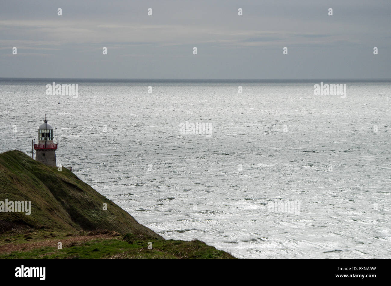 Tip of the Bailey Lighthouse overlooking the Irish Sea - Howth Head, Dublin Stock Photo