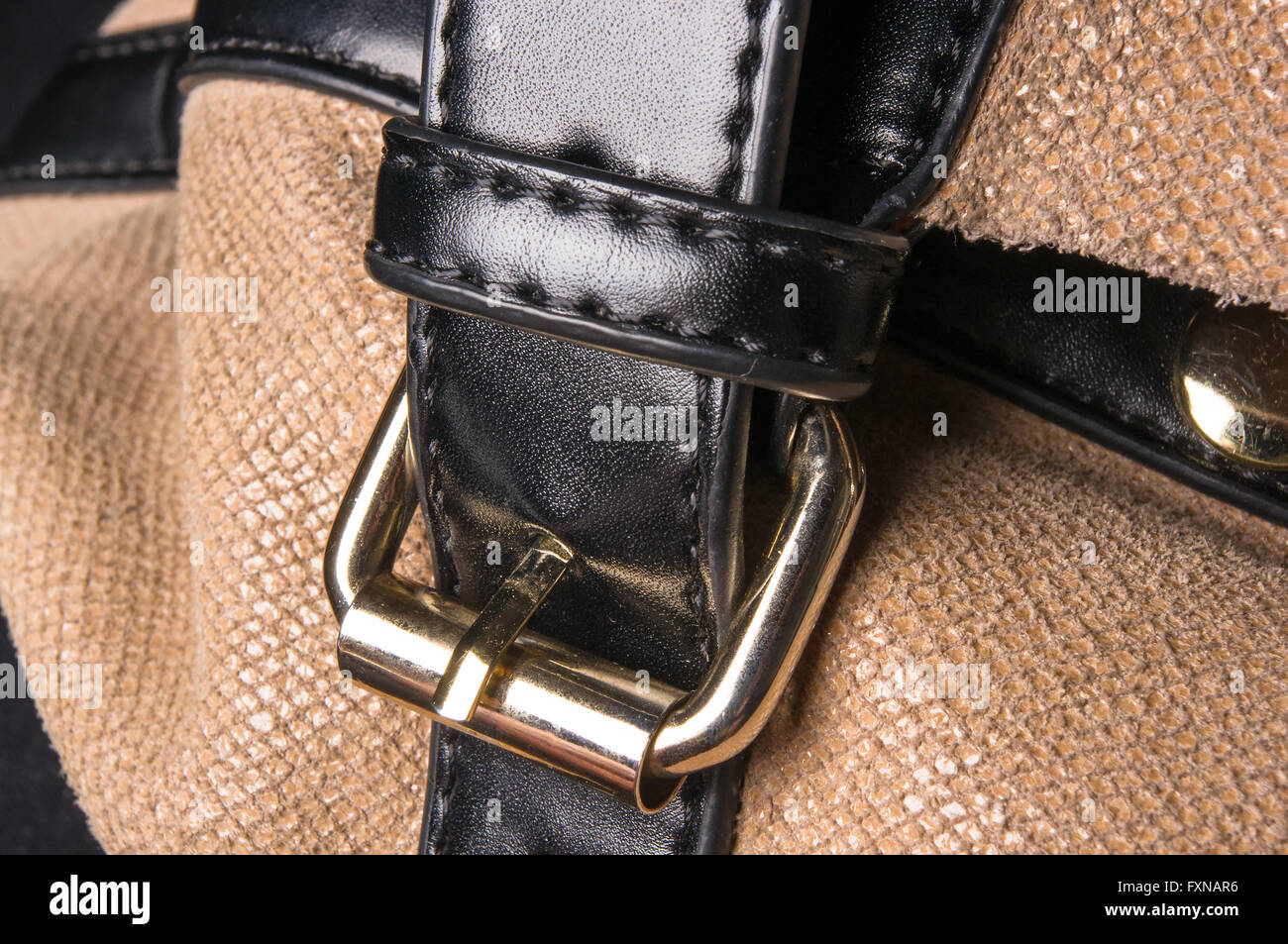 closeup of the fittings on the brown leather hand bag Stock Photo