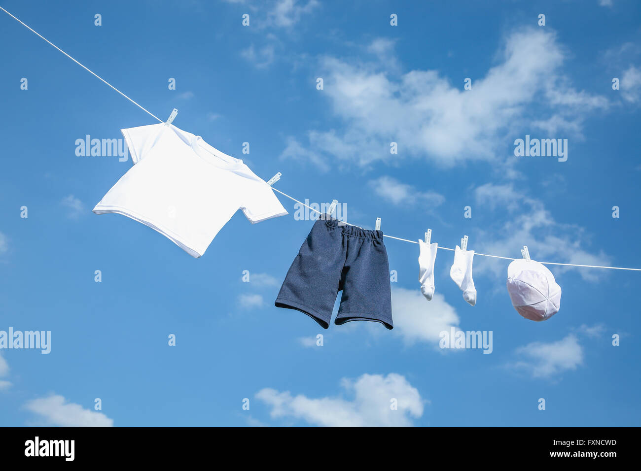 Laundry hanging against blue sky Stock Photo Alamy