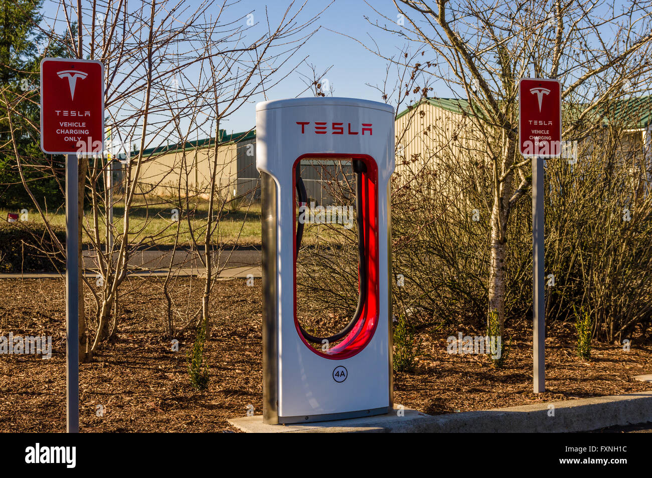 Tesla electric vehicle charging stations at a grocery store. Sandy, Oregon Stock Photo Alamy