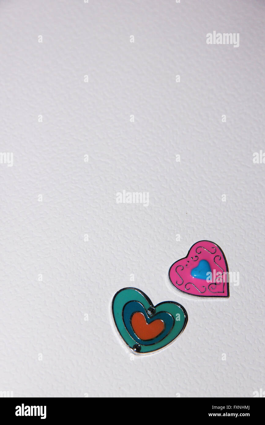Heart shape on white textured paper Stock Photo - Alamy