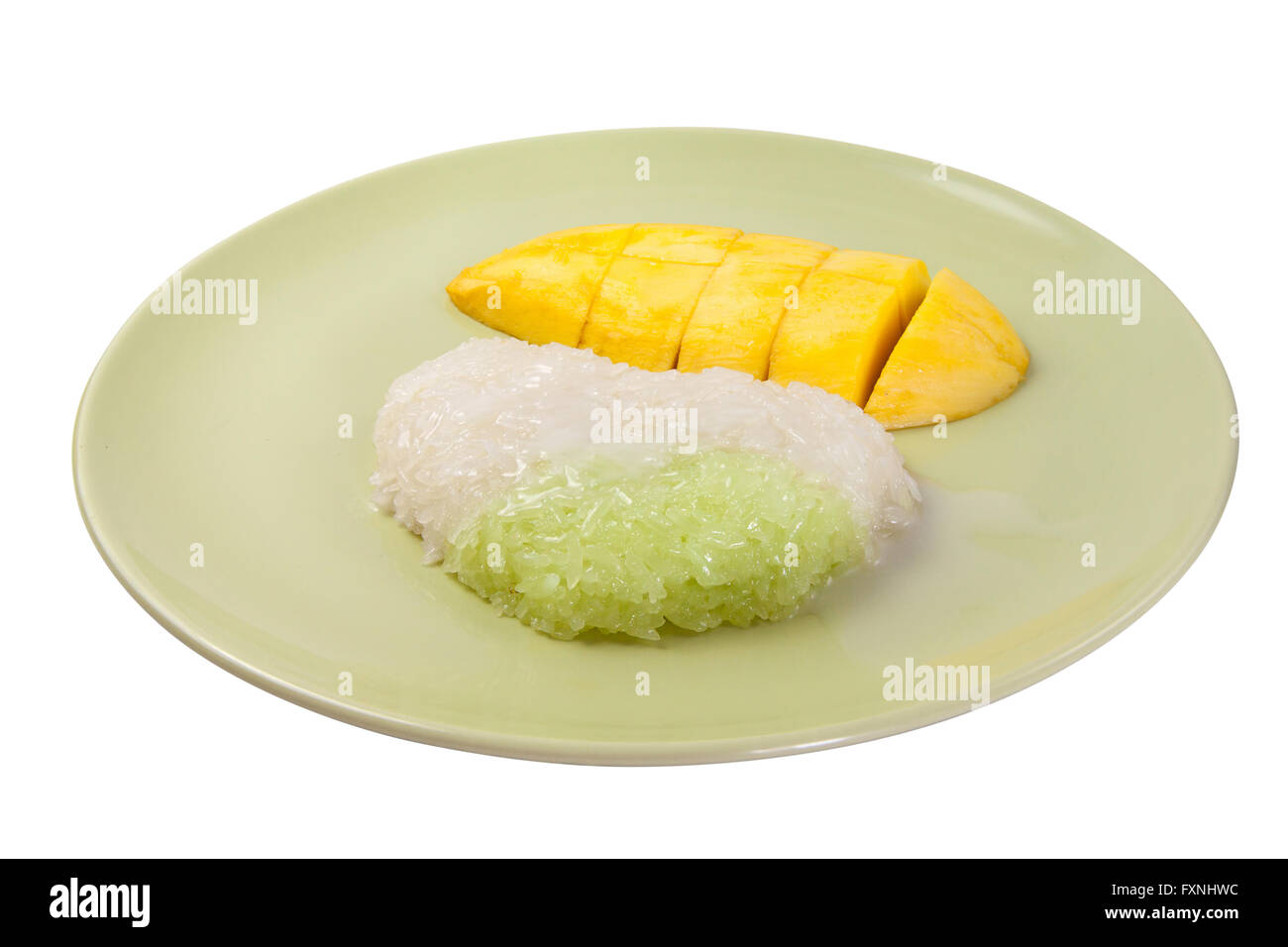 Sticky rice cooked in sweetened thick coconut milk, served with slices of ripe mango. Thai Dessert Sweet. Stock Photo