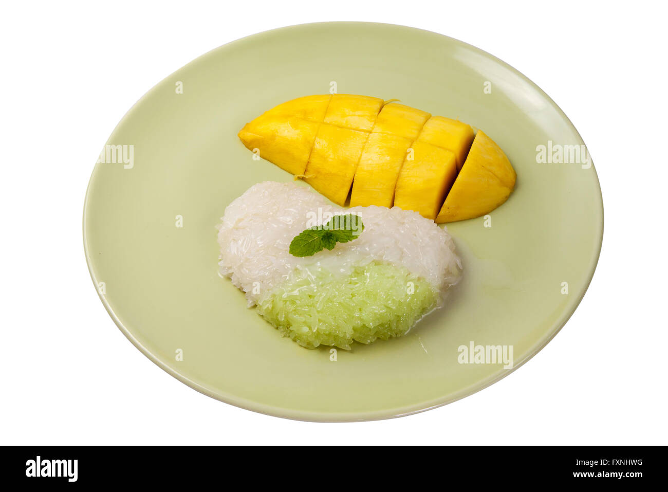 Sticky rice cooked in sweetened thick coconut milk, served with slices of ripe mango. Thai Dessert Sweet. Stock Photo
