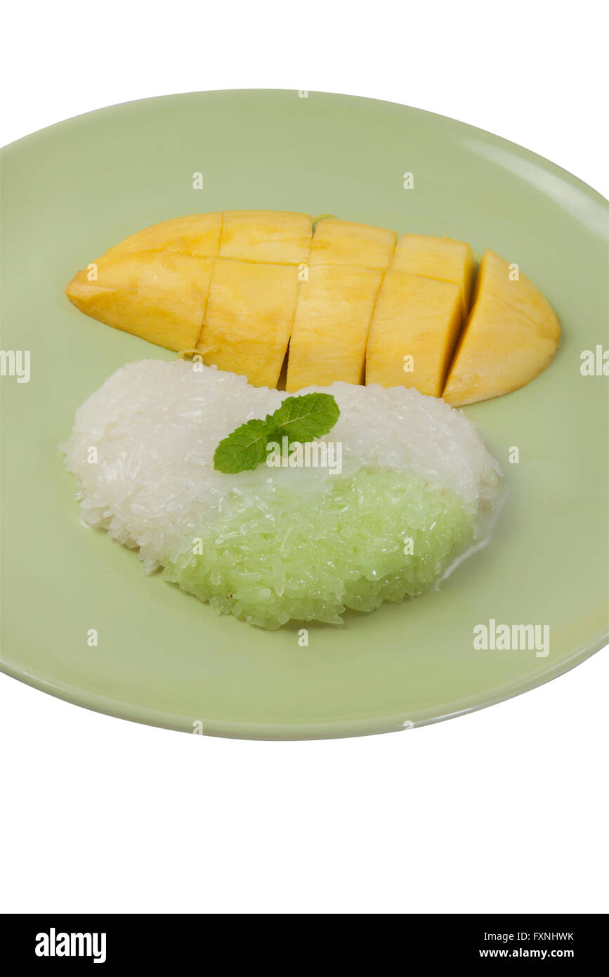 Sticky rice cooked in sweetened thick coconut milk, served with slices of ripe mango. Thai Dessert Sweet. Stock Photo