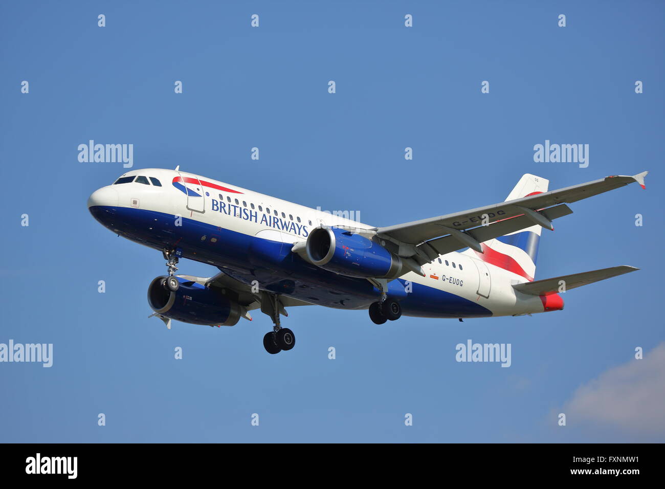 British Airways Airbus A319-131 G-EUOG landing at London Heathrow Airport Stock Photo