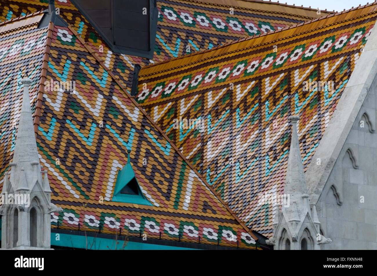 The coloured tiled roof of Matthias Church on Buda Castle hill in Budapest, Hungary. Stock Photo