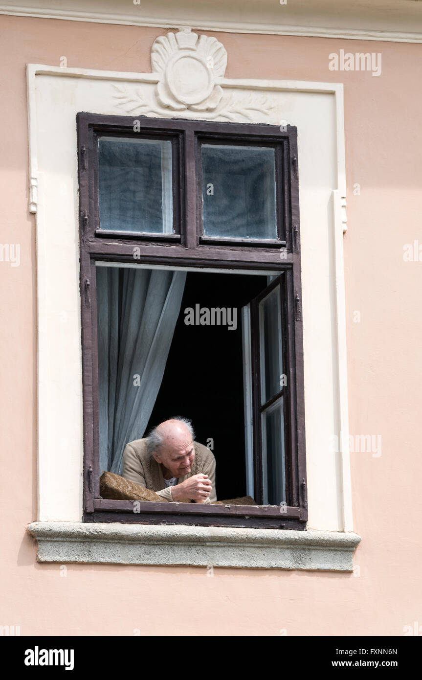 An elderly resident at his home in Fortuna Street on Buda Castle Hill, Budapest, Hungary Stock Photo