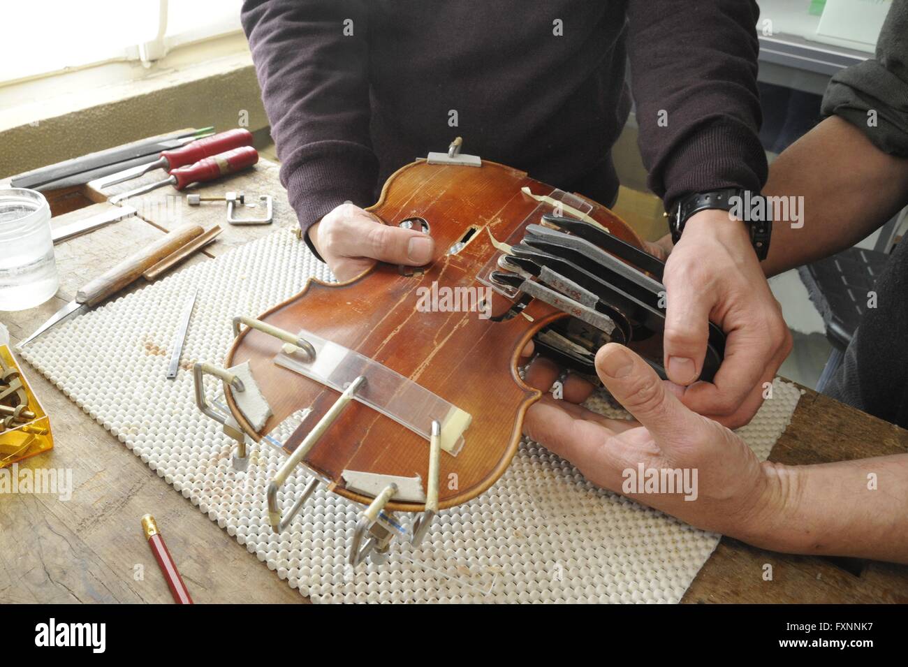 Antique violin 2024 restoration near me