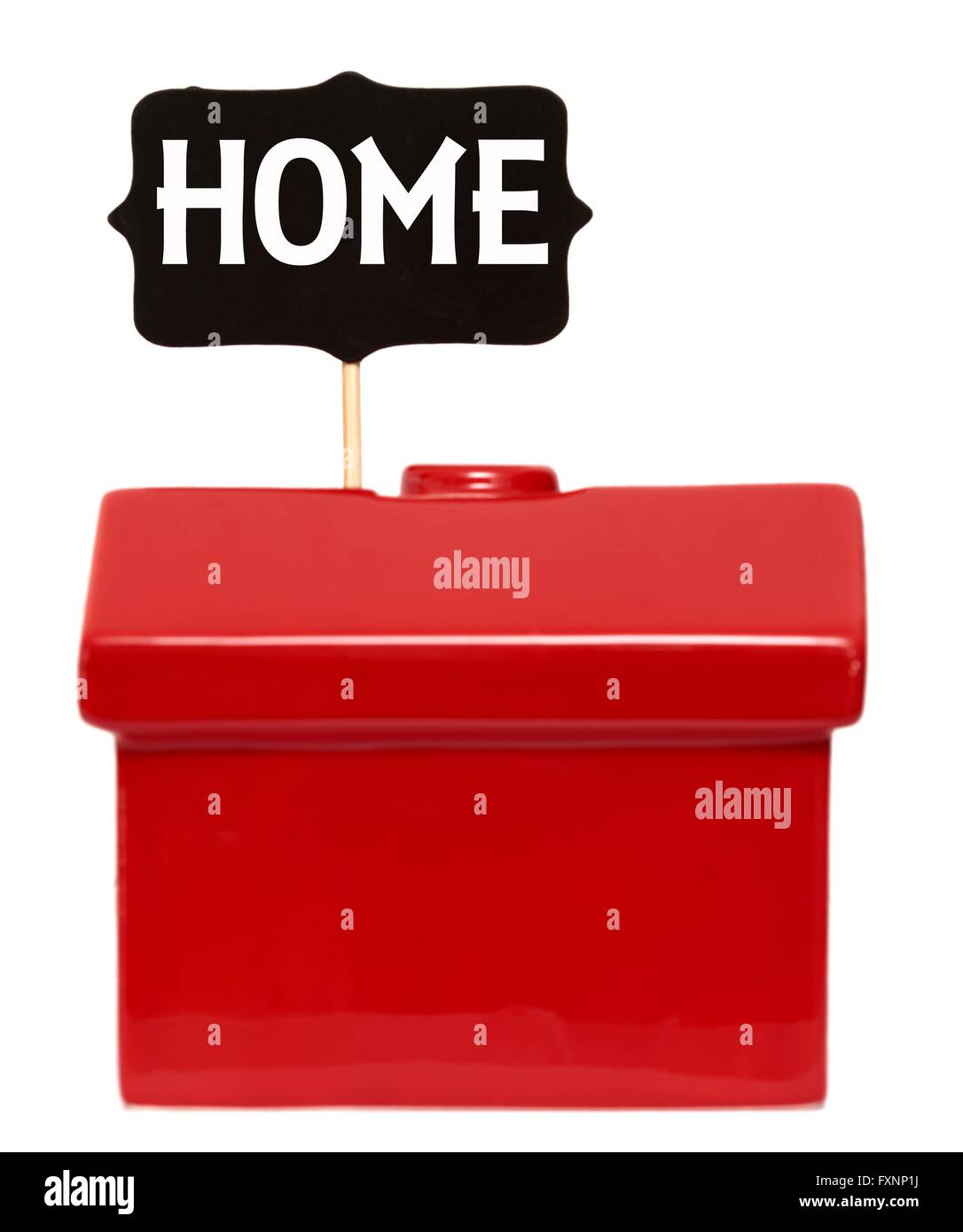 Red house with home sign Stock Photo