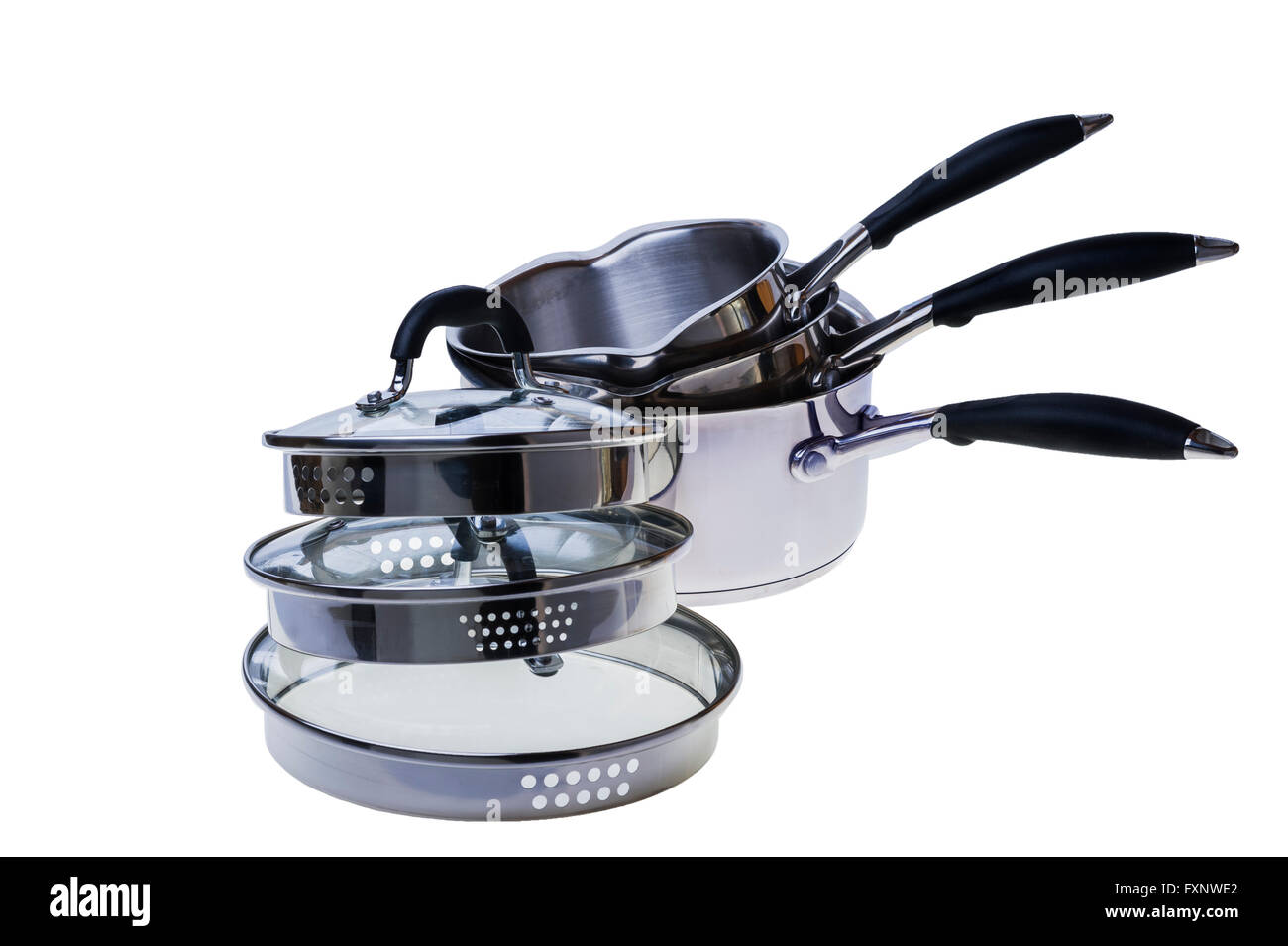 Three stainless steel saucepans and glass topped lids. Stock Photo
