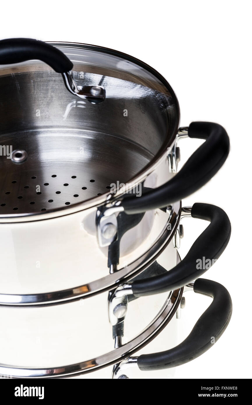 Three tier stainless steel steamer, with glass lid. Stock Photo