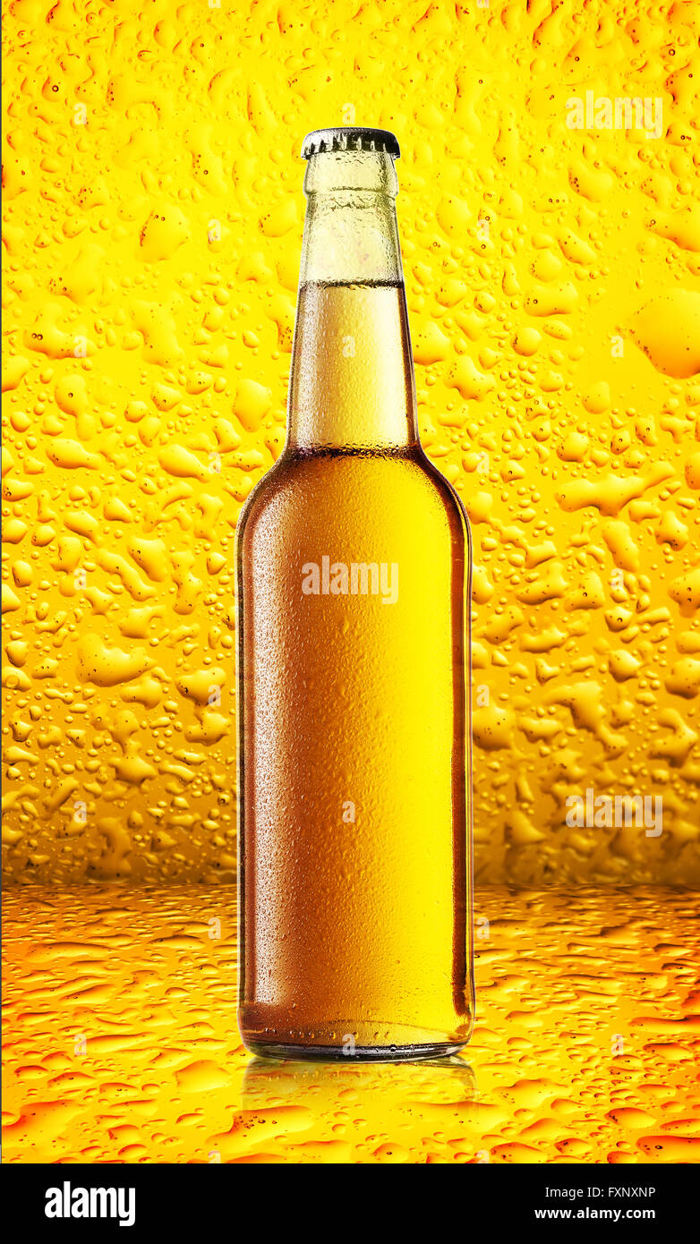 Yellow Bottle Cold Beer On Background Of Yellow Glass With Drops Stock Photo Alamy