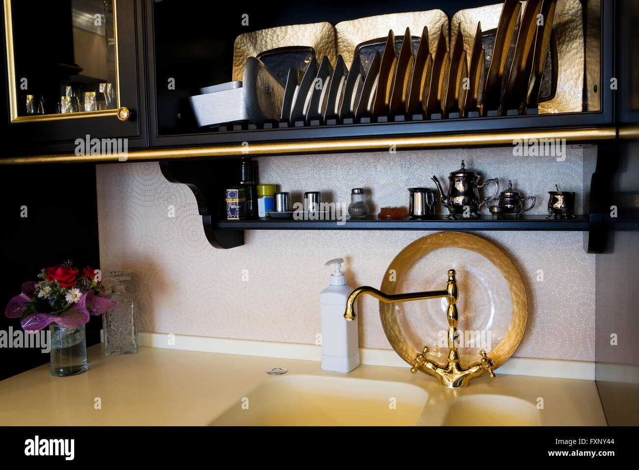 Beautiful sink with the faucet in modern kitchen Stock Photo - Alamy