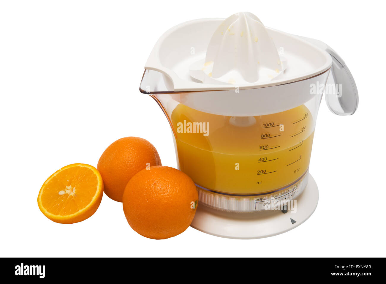 Modern juice extractor with juice and ripe oranges Stock Photo Alamy