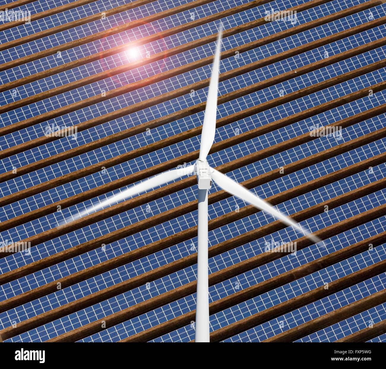 Wind turbine and solar panels. Stock Photo