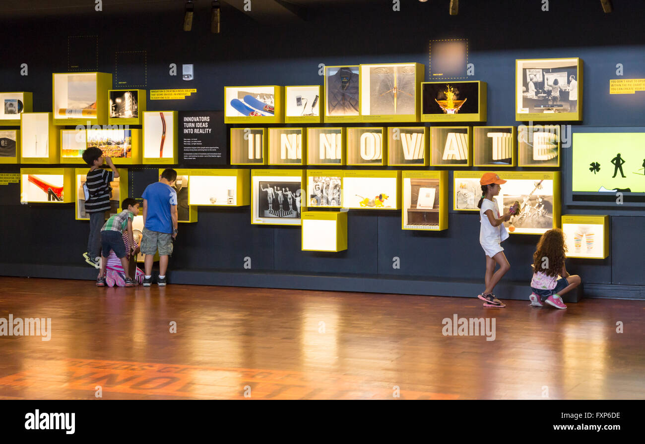 Children viewing exhibits at the Museum of History and Industry interior, Seattle, Washington, United States Stock Photo