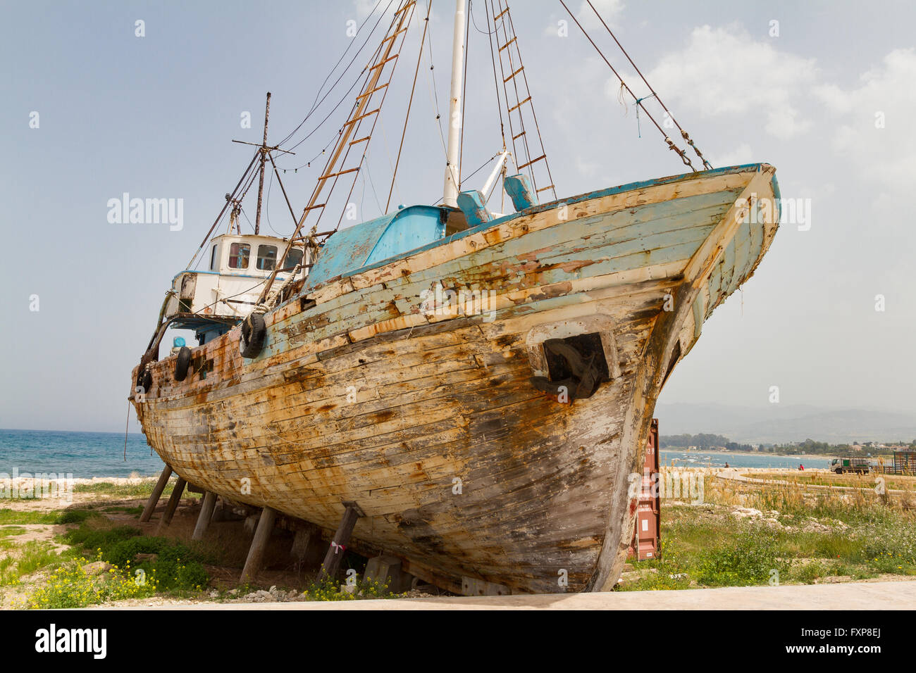 Old Derelict Wooden Fishing Boat Wreck in Latsi, Cyprus Stock Photo - Alamy